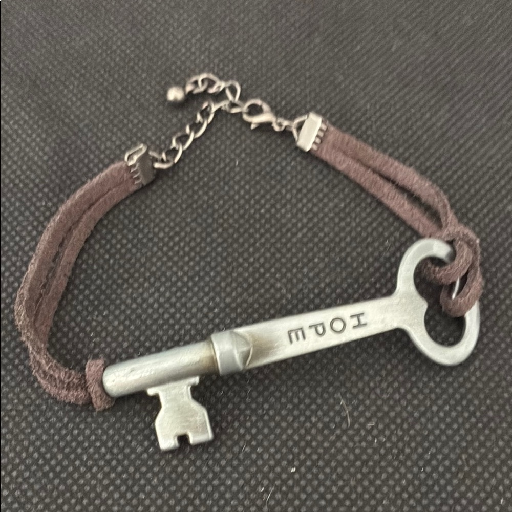 Elegant Brown and Silver Bracelet with Key Charm. Definately not a bag!